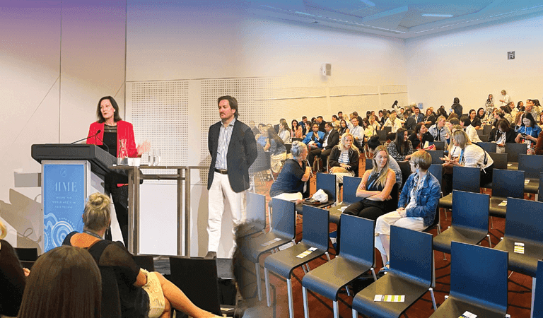 Image of an on stage presentation merged with an image of the crod at the AIME Conference 2024